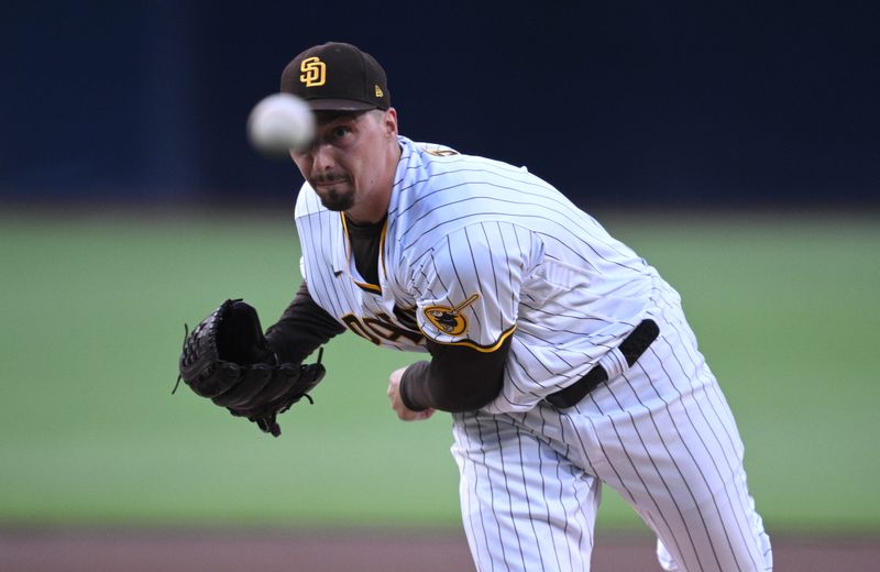 Jul 8, 2023; San Diego, California, USA; San Diego Padres starting pitcher Blake Snell (4) throws a pitch against the New York Mets during the first inning at Petco Park. Mandatory Credit: Orlando Ramirez-USA TODAY Sports