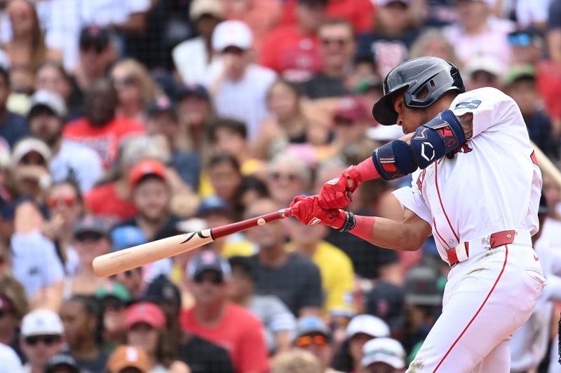 Aug 11, 2024; Boston, Massachusetts, USA; Boston Red Sox center fielder Ceddanne Rafaela (43) hits a single against the Houston Astros during the third inning at Fenway Park. Mandatory Credit: Eric Canha-USA TODAY Sports