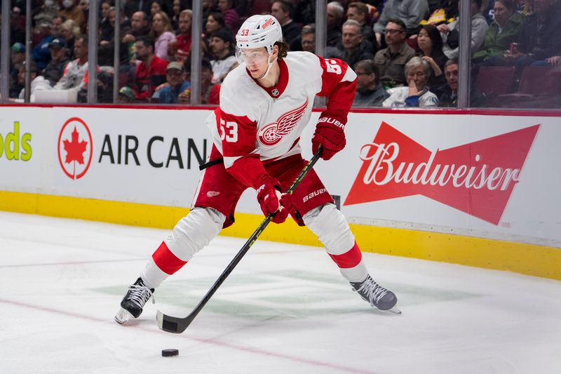 Feb 13, 2023; Vancouver, British Columbia, CAN; Detroit Red Wings defenseman Moritz Seider (53) handles the puck against the Vancouver Canucks in the third period at Rogers Arena. Red Wings won 6-1. Mandatory Credit: Bob Frid-USA TODAY Sports