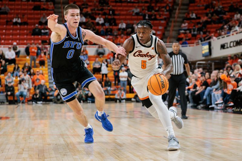 Feb 17, 2024; Stillwater, Oklahoma, USA; Oklahoma State Cowboys guard Quion Williams (5) drives around Brigham Young Cougars forward Noah Waterman (0) during the first half at Gallagher-Iba Arena. Mandatory Credit: William Purnell-USA TODAY Sports