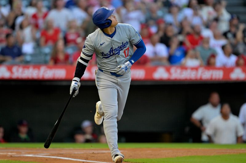 Sep 4, 2024; Anaheim, California, USA;  Los Angeles Dodgers designated hitter Shohei Ohtani (17) flies out in the first inning against the Los Angeles Angels at Angel Stadium. Mandatory Credit: Jayne Kamin-Oncea-Imagn Images