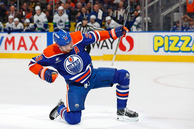 Jan 23, 2025; Edmonton, Alberta, CAN; Edmonton Oilers forward Leon Draisaitl (29) celebrates after scoring a goal against the Vancouver Canucks at Rogers Place. Mandatory Credit: Perry Nelson-Imagn Images