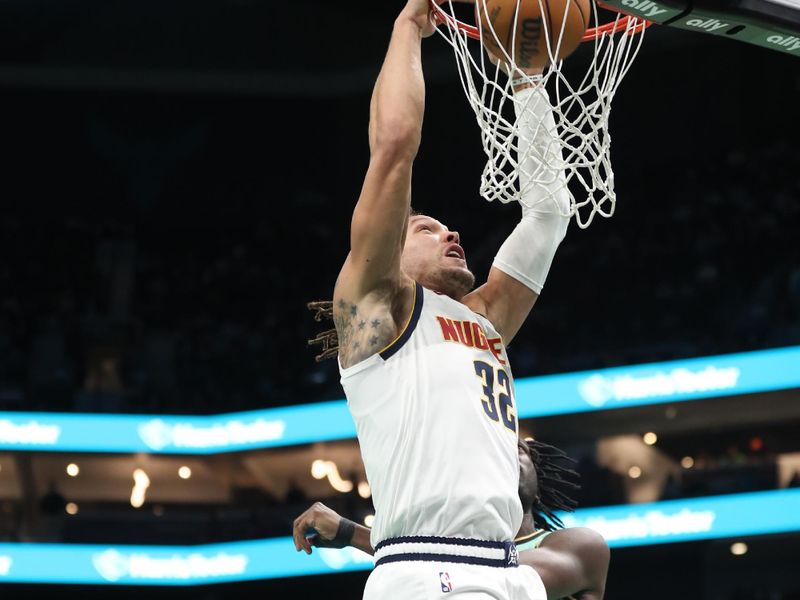 CHARLOTTE, NC - FEBRUARY 1: Aaron Gordon #32 of the Denver Nuggets dunks the ball during the game against the Charlotte Hornets on February 1, 2025 at Spectrum Center in Charlotte, North Carolina. NOTE TO USER: User expressly acknowledges and agrees that, by downloading and or using this photograph, User is consenting to the terms and conditions of the Getty Images License Agreement. Mandatory Copyright Notice: Copyright 2025 NBAE (Photo by Brock Williams-Smith/NBAE via Getty Images)