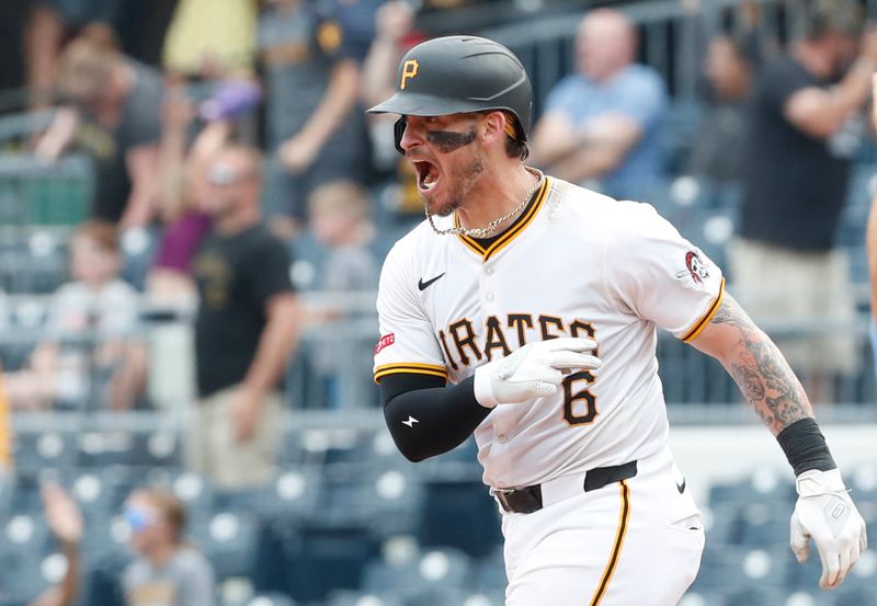 Aug 25, 2024; Pittsburgh, Pennsylvania, USA;  Pittsburgh Pirates catcher Yasmani Grandal (6) reacts after hitting a game winning walk-off two run home run against the Cincinnati Reds during the ninth inning at PNC Park. Mandatory Credit: Charles LeClaire-USA TODAY Sports