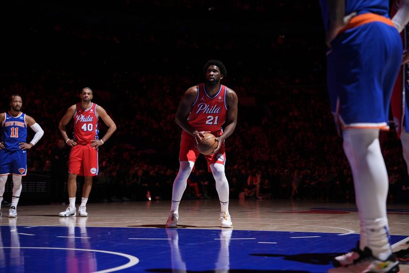 PHILADELPHIA, PA - JANUARY 5: Joel Embiid #21 of the Philadelphia 76ers shoots a free throw during the game against the New York Knicks on January 5, 2024 at the Wells Fargo Center in Philadelphia, Pennsylvania NOTE TO USER: User expressly acknowledges and agrees that, by downloading and/or using this Photograph, user is consenting to the terms and conditions of the Getty Images License Agreement. Mandatory Copyright Notice: Copyright 2024 NBAE (Photo by Jesse D. Garrabrant/NBAE via Getty Images)