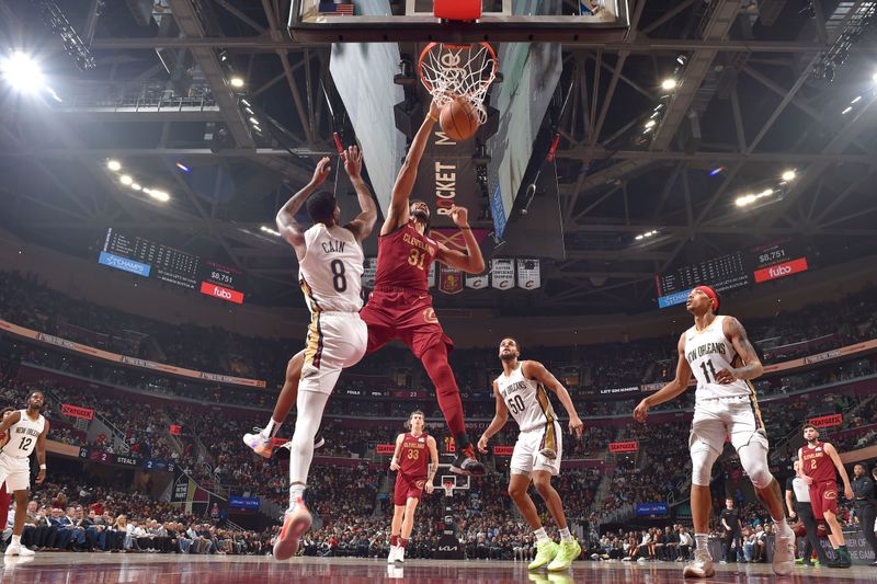 CLEVELAND, OH - NOVEMBER 20: Jarrett Allen #31 of the Cleveland Cavaliers dunks the ball during the game against the New Orleans Pelicans on November 20, 2024 at Rocket Mortgage FieldHouse in Cleveland, Ohio. NOTE TO USER: User expressly acknowledges and agrees that, by downloading and/or using this Photograph, user is consenting to the terms and conditions of the Getty Images License Agreement. Mandatory Copyright Notice: Copyright 2024 NBAE (Photo by David Liam Kyle/NBAE via Getty Images)