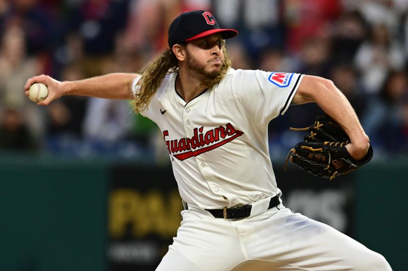 May 4, 2024; Cleveland, Ohio, USA; Cleveland Guardians relief pitcher Scott Barlow (58) throws a pitch during the ninth inning against the Los Angeles Angels at Progressive Field. Mandatory Credit: Ken Blaze-USA TODAY Sports