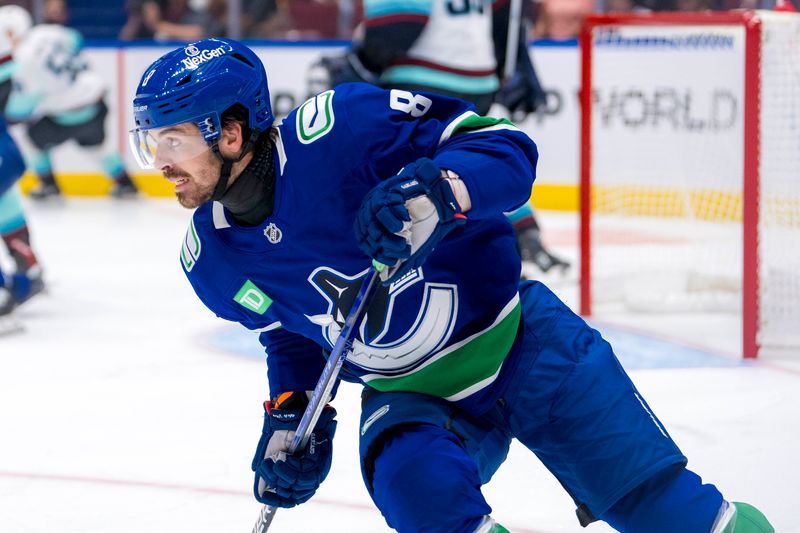 Sep 24, 2024; Vancouver, British Columbia, CAN;  Vancouver Canucks forward Conor Garland (8) skates against the Seattle Kraken during the third period at Rogers Arena. Mandatory Credit: Bob Frid-Imagn Images