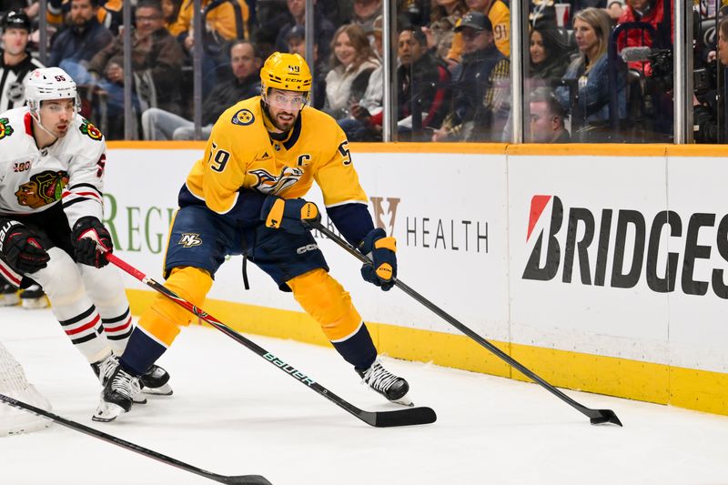 Jan 10, 2026; Nashville, Tennessee, USA;  Nashville Predators defenseman Roman Josi (59) skates behind the net against the Chicago Blackhawks during the first period at Bridgestone Arena. Mandatory Credit: Steve Roberts-Imagn Images