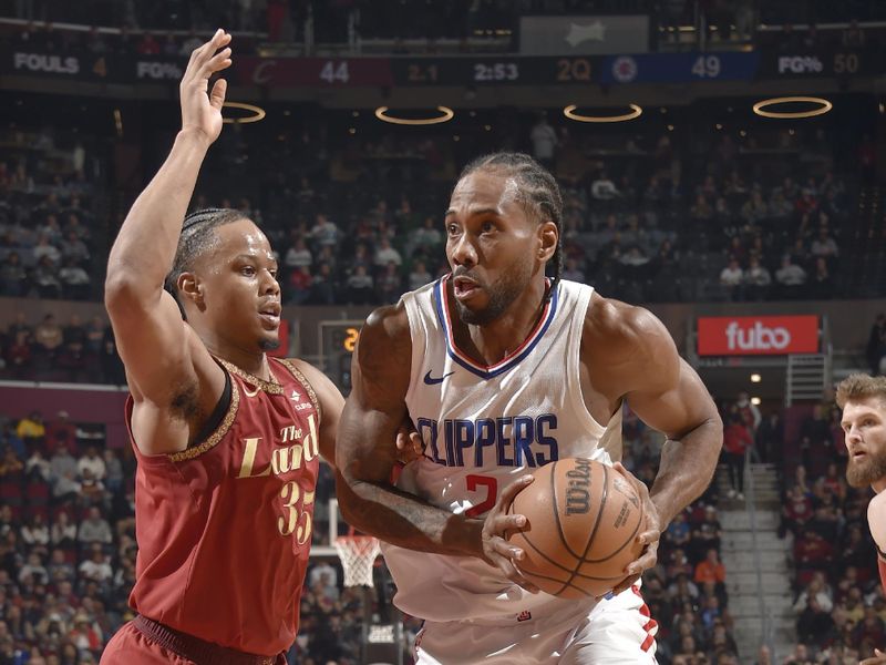 CLEVELAND, OH - JANUARY 29: Kawhi Leonard #2 of the LA Clippers drives to the basket during the game against the Cleveland Cavaliers on January 29, 2024 at Rocket Mortgage FieldHouse in Cleveland, Ohio. NOTE TO USER: User expressly acknowledges and agrees that, by downloading and/or using this Photograph, user is consenting to the terms and conditions of the Getty Images License Agreement. Mandatory Copyright Notice: Copyright 2024 NBAE (Photo by David Liam Kyle/NBAE via Getty Images)