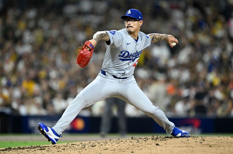 Oct 9, 2024; San Diego, California, USA; Los Angeles Dodgers pitcher Anthony Banda (43) throws in the second inning against the San Diego Padres during game four of the NLDS for the 2024 MLB Playoffs at Petco Park.  Mandatory Credit: Denis Poroy-Imagn Images