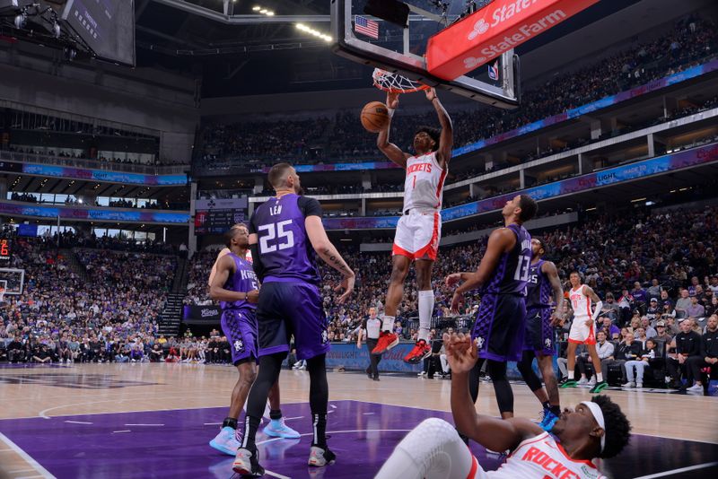 SACRAMENTO, CA - MARCH 10: Amen Thompson #1 of the Houston Rockets dunks the ball during the game against the Sacramento Kings on March 10, 2024 at Golden 1 Center in Sacramento, California. NOTE TO USER: User expressly acknowledges and agrees that, by downloading and or using this Photograph, user is consenting to the terms and conditions of the Getty Images License Agreement. Mandatory Copyright Notice: Copyright 2024 NBAE (Photo by Rocky Widner/NBAE via Getty Images)