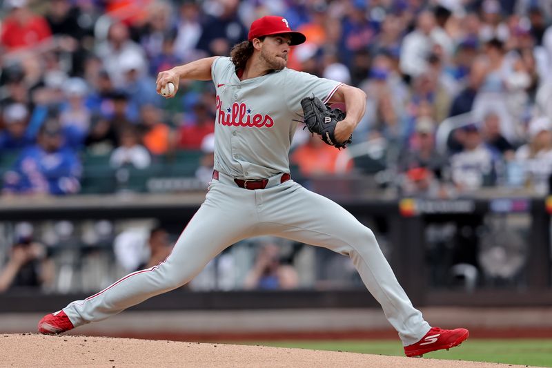 May 14, 2024; New York City, New York, USA; Philadelphia Phillies starting pitcher Aaron Nola (27) pitches against the New York Mets during the first inning at Citi Field. Mandatory Credit: Brad Penner-USA TODAY Sports