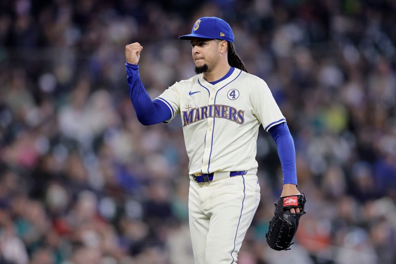 Jun 2, 2024; Seattle, Washington, USA; Seattle Mariners starting pitcher Luis Castillo (58) pumps his fist after the Los Angeles Angels final out of the seventh inning at T-Mobile Park. Mandatory Credit: John Froschauer-USA TODAY Sports