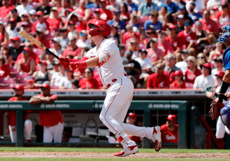 Sep 3, 2023; Cincinnati, Ohio, USA; Cincinnati Reds catcher Tyler Stephenson (37) watches hitting a two-run home run against the Chicago Cubs during the second inning at Great American Ball Park. Mandatory Credit: David Kohl-USA TODAY Sports