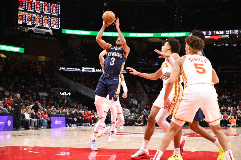 ATLANTA, GA - DECEMBER 2: CJ McCollum #3 of the New Orleans Pelicans shoots the ball during the game against the Atlanta Hawks on December 2, 2024 at State Farm Arena in Atlanta, Georgia.  NOTE TO USER: User expressly acknowledges and agrees that, by downloading and/or using this Photograph, user is consenting to the terms and conditions of the Getty Images License Agreement. Mandatory Copyright Notice: Copyright 2024 NBAE (Photo by Adam Hagy/NBAE via Getty Images)