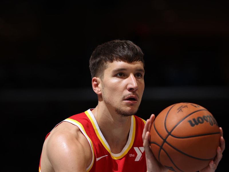 MEMPHIS, TN - MARCH 8: Bogdan Bogdanovic #13 of the Atlanta Hawks shoots a free throw during the game against the Memphis Grizzlies on March 8, 2024 at FedExForum in Memphis, Tennessee. NOTE TO USER: User expressly acknowledges and agrees that, by downloading and or using this photograph, User is consenting to the terms and conditions of the Getty Images License Agreement. Mandatory Copyright Notice: Copyright 2024 NBAE (Photo by Joe Murphy/NBAE via Getty Images)