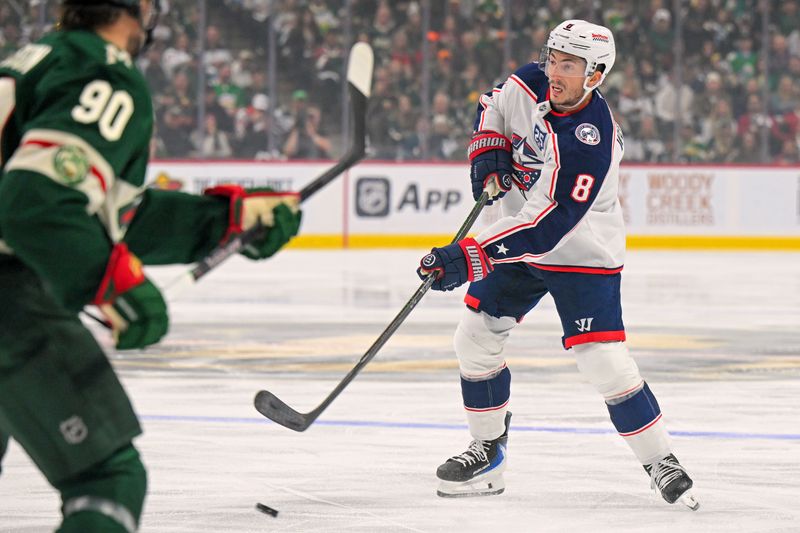 Oct 11, 2025; Saint Paul, Minnesota, USA;  Columbus Blue Jackets defensemen Zach Werenski (8) makes a pass against the Minnesota Wild during the first period at Grand Casino Arena. Mandatory Credit: Nick Wosika-Imagn Images