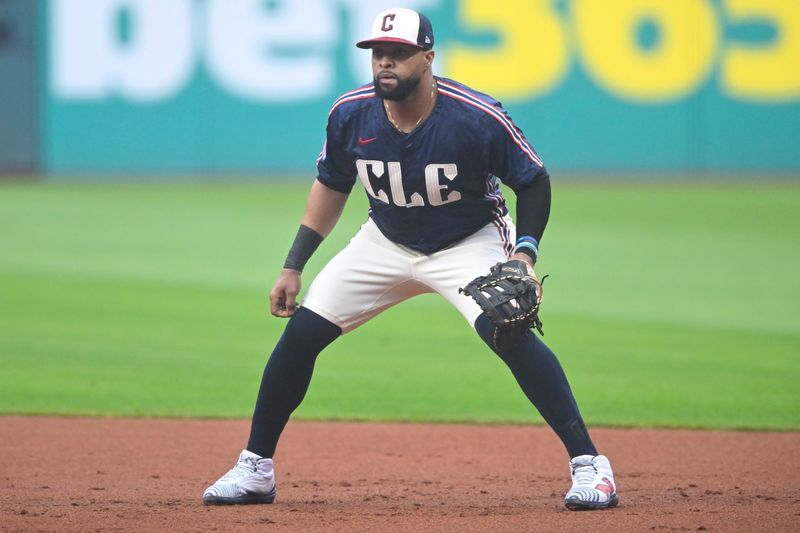 Jun 6, 2025; Cleveland, Ohio, USA; Cleveland Guardians first baseman Carlos Santana (41) stands on the field in the third inning against the Houston Astros at Progressive Field. Mandatory Credit: David Richard-Imagn Images