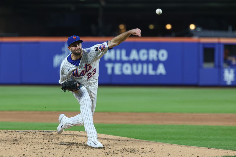 Apr 29, 2025; New York City, New York, USA; New York Mets starting pitcher David Peterson (23) delivers a pitch during the third inning against the Arizona Diamondbacks at Citi Field. Mandatory Credit: Vincent Carchietta-Imagn Images