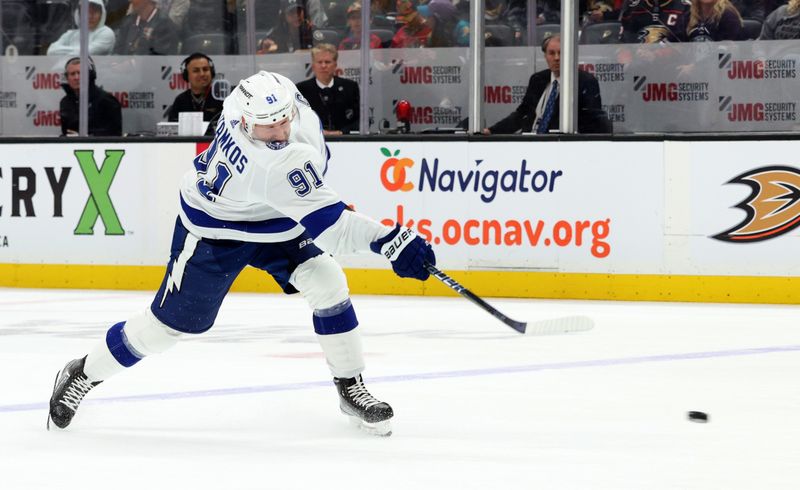 Mar 24, 2024; Anaheim, California, USA; Tampa Bay Lightning center Steven Stamkos (91) shoots during the first period against the Anaheim Ducks at Honda Center. Mandatory Credit: Jason Parkhurst-USA TODAY Sports