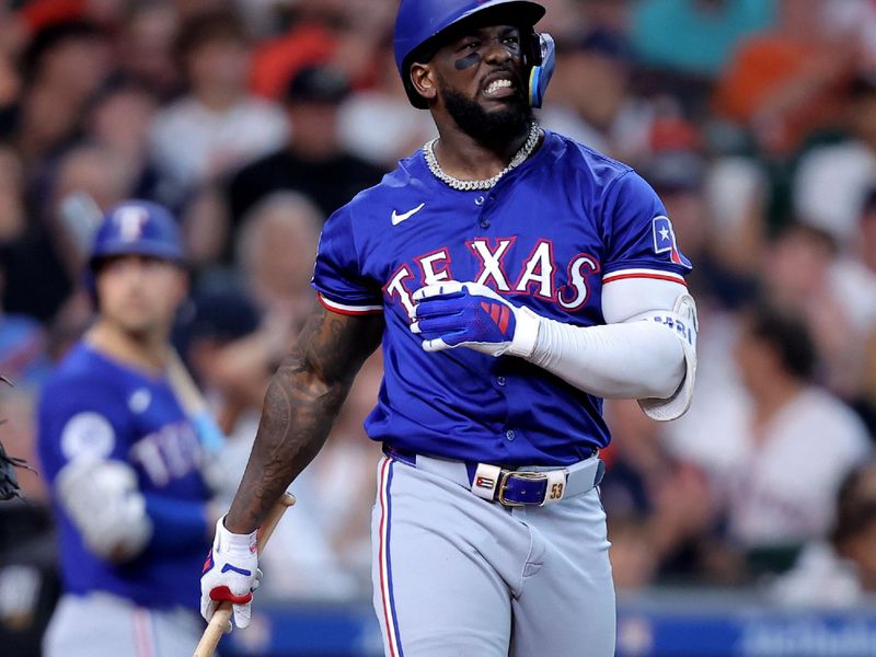 Jul 13, 2024; Houston, Texas, USA; Texas Rangers right fielder Adolis García (53) reacts after a strike against the Houston Astros during the sixth inning at Minute Maid Park. Mandatory Credit: Erik Williams-USA TODAY Sports