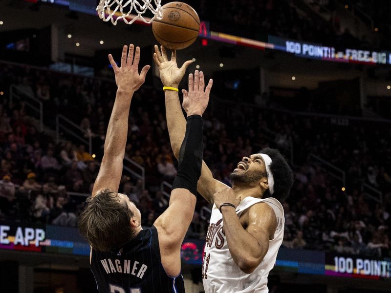 CLEVELAND, OHIO - FEBRUARY 22: Jarrett Allen #31 of the Cleveland Cavaliers goes in for a layup during the game against the against the Orlando Magic at Rocket Mortgage Fieldhouse on February 22, 2024 in Cleveland, Ohio. The Magic beat the Cavaliers 116-109.<p><br/></p>NOTE TO USER: User expressly acknowledges and agrees that, by downloading and or using this photograph, User is consenting to the terms and conditions of the Getty Images License Agreement. (Photo by Lauren Leigh Bacho/Getty Images)