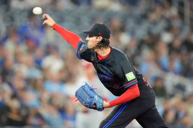 Sep 13, 2024; Toronto, Ontario, CAN; Toronto Blue Jays starting pitcher Kevin Gausman (34) pitches to the St. Louis Cardinals during the fourth inning at Rogers Centre. Mandatory Credit: John E. Sokolowski-Imagn Images