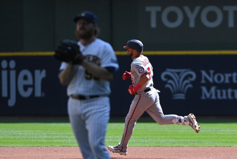 Sep 17, 2023; Milwaukee, Wisconsin, USA; Washington Nationals second baseman Luis Garcia (2) rounds the bases after hitting a home run against Milwaukee Brewers starting pitcher Brandon Woodruff (53) in the first inning at American Family Field. Mandatory Credit: Michael McLoone-USA TODAY Sports