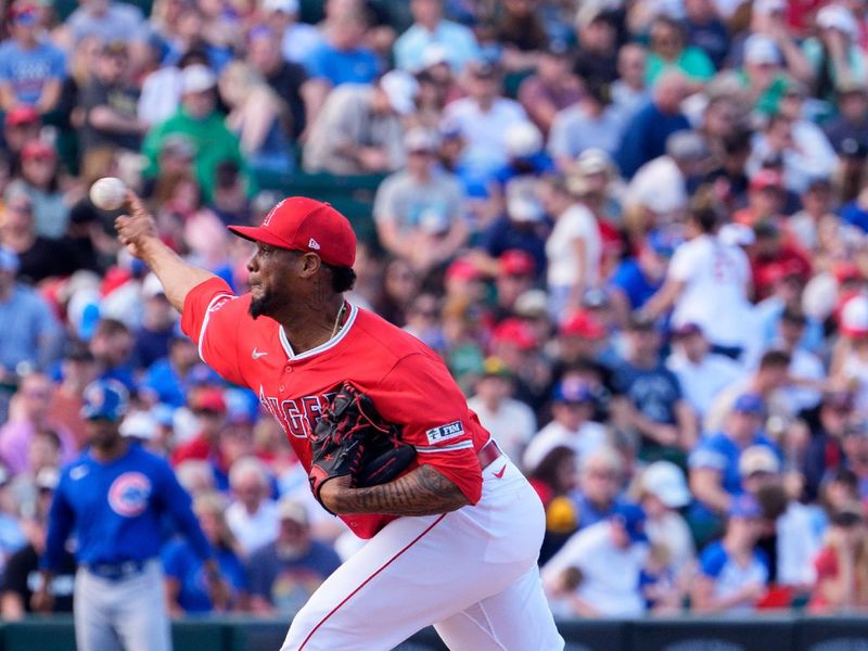 Mar 16, 2024; Tempe, Arizona, USA; Los Angeles Angels pitcher Jose Cisnero (67) pitches in at the top of the seventh inning during a spring training game against the Chicago Cubs at Tempe Diablo Stadium. Mandatory Credit: Allan Henry-USA TODAY Sports