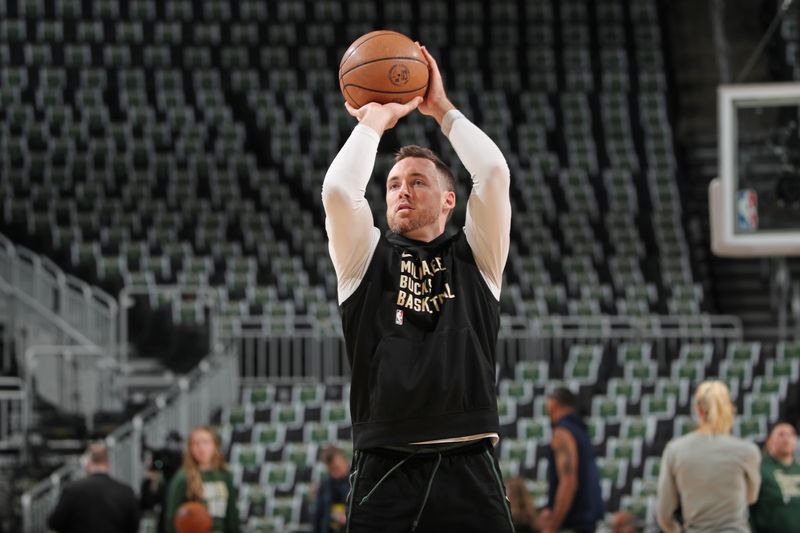 MILWAUKEE, WI - APRIL 21: Pat Connaughton #24 of the Milwaukee Bucks warms up before the game against the Indiana Pacers during Round 1 Game 1 of the 2024 NBA Playoffs on April 21, 2024 at the Fiserv Forum Center in Milwaukee, Wisconsin. NOTE TO USER: User expressly acknowledges and agrees that, by downloading and or using this Photograph, user is consenting to the terms and conditions of the Getty Images License Agreement. Mandatory Copyright Notice: Copyright 2024 NBAE (Photo by Gary Dineen/NBAE via Getty Images).