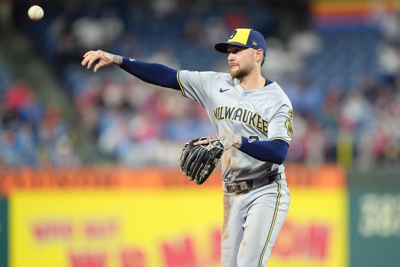 May 30, 2025; Philadelphia, Pennsylvania, USA; Milwaukee Brewers infielder Brice Turang (2) throws to first against the Philadelphia Phillies in the ninth inning at Citizens Bank Park. Mandatory Credit: Kyle Ross-Imagn Images