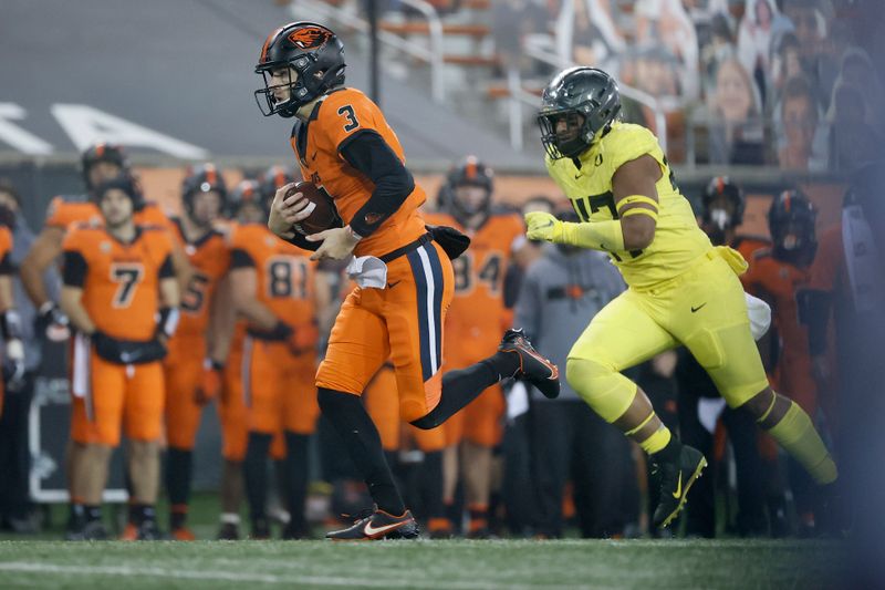 Nov 27, 2020; Corvallis, Oregon, USA; Oregon State Beavers quarterback Tristan Gebbia (3) carries the ball against the Oregon Ducks during the second half at Reser Stadium. Mandatory Credit: Soobum Im-USA TODAY Sports