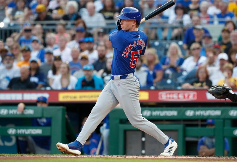 Aug 26, 2024; Pittsburgh, Pennsylvania, USA;  Chicago Cubs center fielder Pete Crow-Armstrong (52) hits an RBI single against the Pittsburgh Pirates during the second inning at PNC Park. Mandatory Credit: Charles LeClaire-USA TODAY Sports