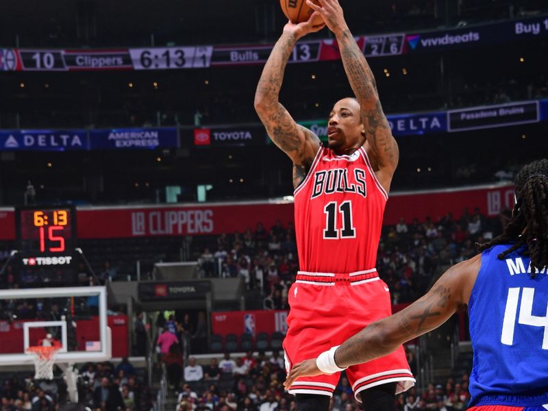 LOS ANGELES, CA - MARCH 9: DeMar DeRozan #11 of the Chicago Bulls shoots the ball during the game against the LA Clippers on March 9, 2024 at Crypto.Com Arena in Los Angeles, California. NOTE TO USER: User expressly acknowledges and agrees that, by downloading and/or using this Photograph, user is consenting to the terms and conditions of the Getty Images License Agreement. Mandatory Copyright Notice: Copyright 2024 NBAE (Photo by Adam Pantozzi/NBAE via Getty Images)