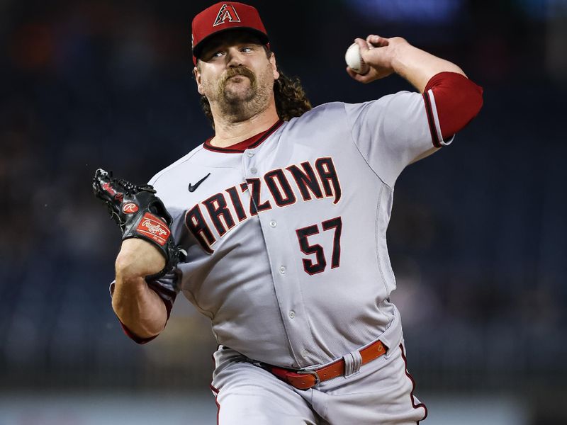 Jun 7, 2023; Washington, District of Columbia, USA; Arizona Diamondbacks relief pitcher Andrew Chafin (57) pitches against the Washington Nationals during the ninth inning at Nationals Park. Mandatory Credit: Scott Taetsch-USA TODAY Sports