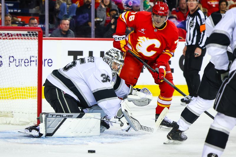 Nov 11, 2024; Calgary, Alberta, CAN; Los Angeles Kings goaltender Darcy Kuemper (35) guards his net against the Calgary Flames during the second period at Scotiabank Saddledome. Mandatory Credit: Sergei Belski-Imagn Images