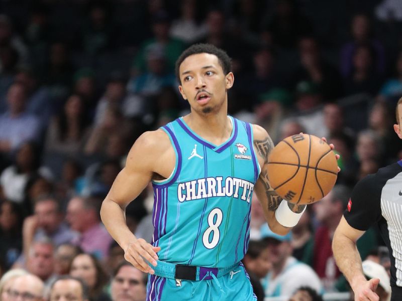 CHARLOTTE, NC - APRIL 1: Nick Smith Jr. #8 of the Charlotte Hornets dribbles the ball during the game against the Boston Celtics on April 1, 2024 at Spectrum Center in Charlotte, North Carolina. NOTE TO USER: User expressly acknowledges and agrees that, by downloading and or using this photograph, User is consenting to the terms and conditions of the Getty Images License Agreement.  Mandatory Copyright Notice:  Copyright 2024 NBAE (Photo by Brock Williams-Smith/NBAE via Getty Images)