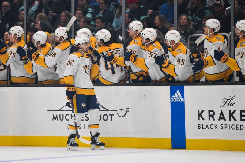 Nov 2, 2023; Seattle, Washington, USA; Nashville Predators center Tommy Novak (82) celebrates with the bench after scoring a goal against the Seattle Kraken during the first period at Climate Pledge Arena. Mandatory Credit: Steven Bisig-USA TODAY Sports