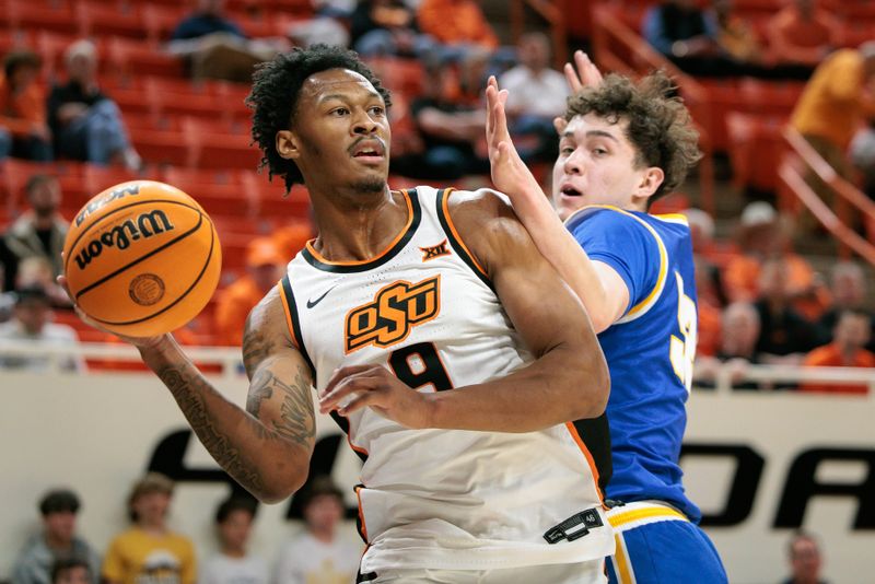 Feb 24, 2026; Stillwater, Oklahoma, USA; Oklahoma State Cowboys guard Anthony Roy (9) passes the ball during the first half against the West Virginia Mountaineers at Gallagher-Iba Arena. Mandatory Credit: William Purnell-Imagn Images