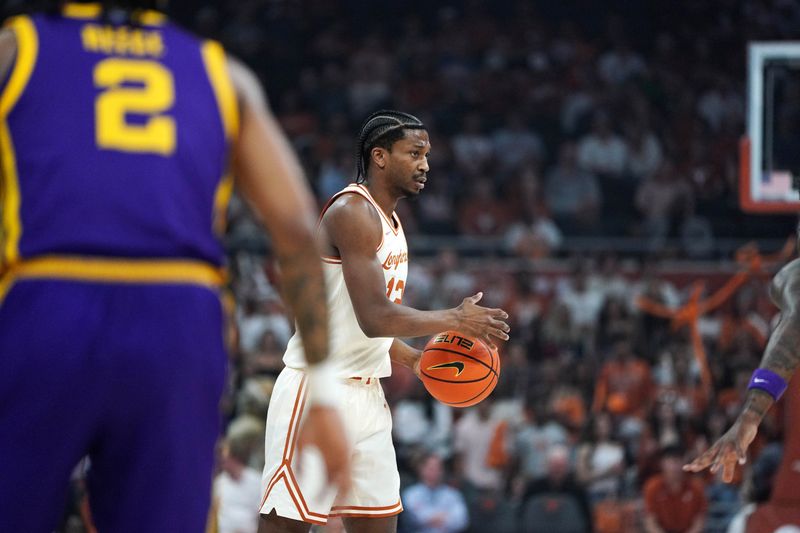 Feb 17, 2026; Austin, Texas, USA;  Texas Longhorns guard Tramon Mark (12) looks to pass the ball during the first half at against the LSU Tigers Moody Center. Mandatory Credit: Dustin Safranek-Imagn Images