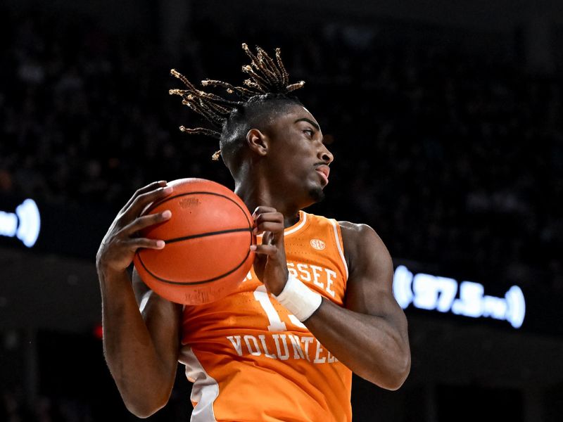 Feb 21, 2023; College Station, Texas, USA;  Tennessee Volunteers guard Jahmai Mashack (15) grabs a rebound during the second half against the Texas A&M Aggies at Reed Arena. Mandatory Credit: Maria Lysaker-USA TODAY Sports