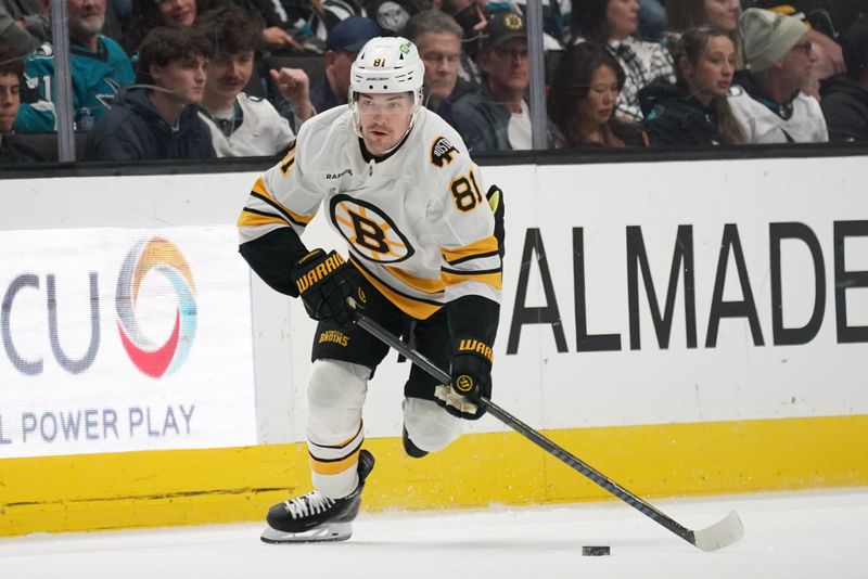 Nov 23, 2025; San Jose, California, USA;  Boston Bruins center Michael Eyssimont (81) advances the puck against the San Jose Sharks in the first period at SAP Center in San Jose. Mandatory Credit: David Gonzales-Imagn Images