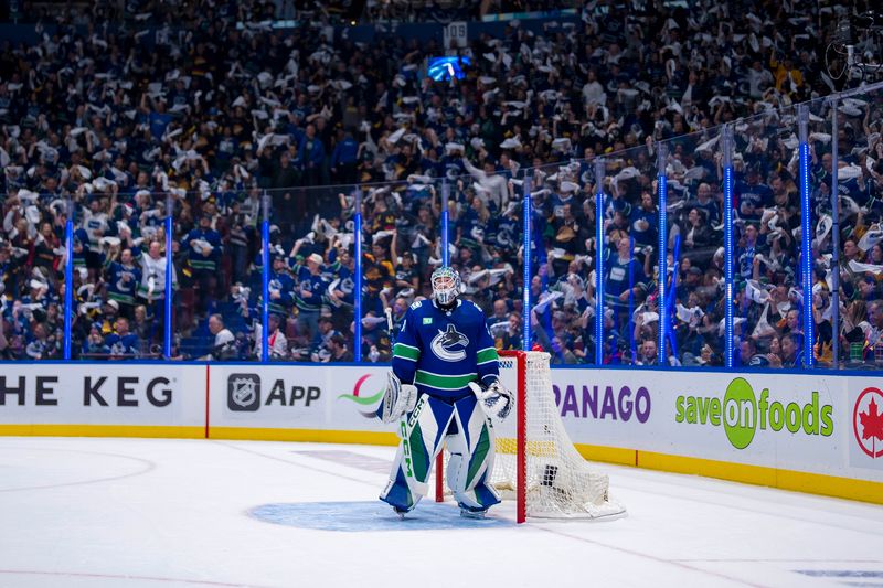 Apr 30, 2024; Vancouver, British Columbia, CAN; Vancouver Canucks goalie Arturs Silvos (31) during a stop in play against the Nashville Predators during the second period in game five of the first round of the 2024 Stanley Cup Playoffs at Rogers Arena. Mandatory Credit: Bob Frid-USA TODAY Sports