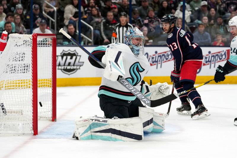 Mar 3, 2023; Columbus, Ohio, USA; Seattle Kraken goaltender Philipp Grubauer (31) attempts to stop a shot during the second period against the Columbus Blue Jackets at Nationwide Arena. Mandatory Credit: Jason Mowry-USA TODAY Sports