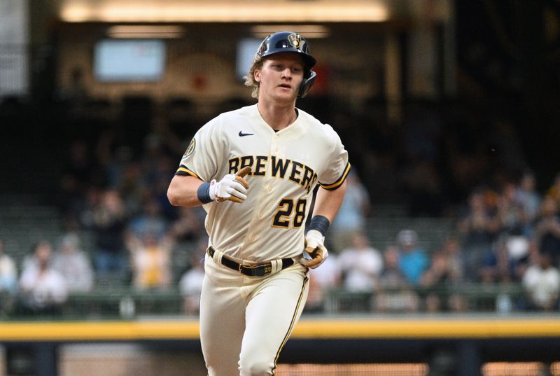 May 23, 2023; Milwaukee, Wisconsin, USA; Milwaukee Brewers right fielder Joey Wiemer (28) rounds the base after hitting a home run against the Houston Astros in the third inning at American Family Field. Mandatory Credit: Michael McLoone-USA TODAY Sports