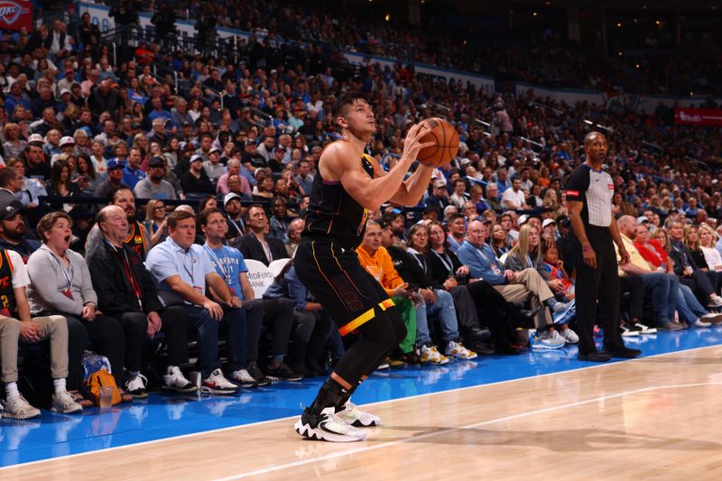 OKLAHOMA CITY, OK - MARCH 29:  Devin Booker #1 of the Phoenix Suns shoots the ball during the game against the Oklahoma City Thunder on March 29, 2024 at Paycom Arena in Oklahoma City, Oklahoma. NOTE TO USER: User expressly acknowledges and agrees that, by downloading and or using this photograph, User is consenting to the terms and conditions of the Getty Images License Agreement. Mandatory Copyright Notice: Copyright 2024 NBAE (Photo by Zach Beeker/NBAE via Getty Images)