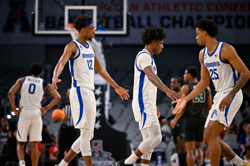 Mar 11, 2023; Fort Worth, TX, USA; Memphis Tigers forward DeAndre Williams (12) and guard Kendric Davis (3) leave the game as guard Jayden Hardaway (25) comes on to the court against the Tulane Green Wave during the second half at Dickies Arena. Mandatory Credit: Jerome Miron-USA TODAY Sports