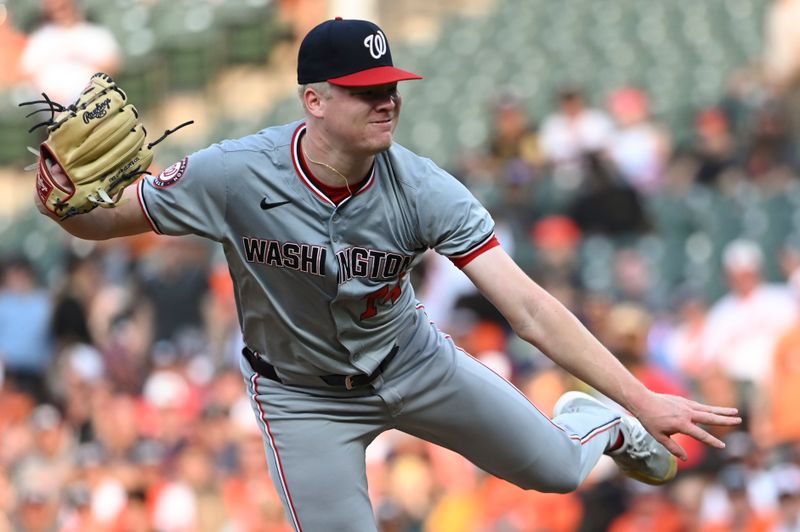 Aug 14, 2024; Baltimore, Maryland, USA; Washington Nationals starting pitcher DJ Herz (74) delivers a first inning pitch against the Baltimore Orioles  at Oriole Park at Camden Yards. Mandatory Credit: Tommy Gilligan-USA TODAY Sports