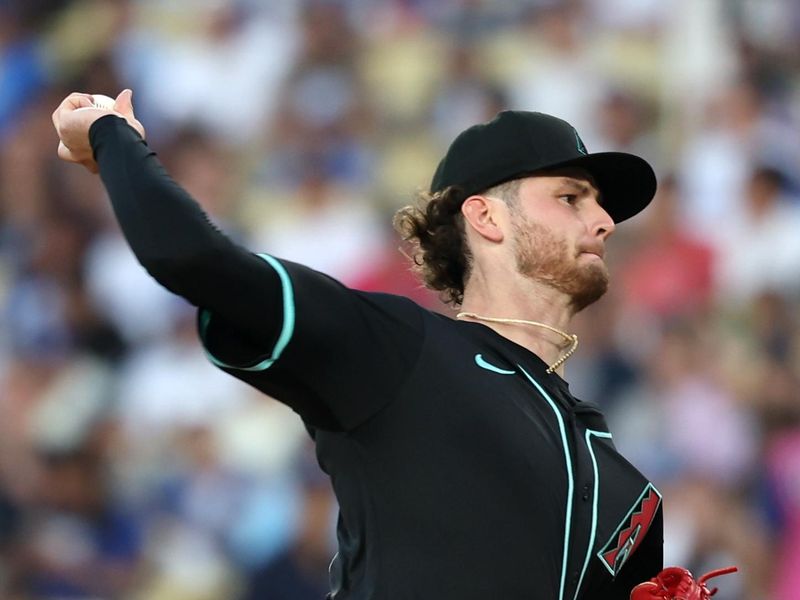 Jul 2, 2024; Los Angeles, California, USA;  Arizona Diamondbacks pitcher Ryne Nelson (19) pitches during the second inning against the Los Angeles Dodgers at Dodger Stadium. Mandatory Credit: Kiyoshi Mio-USA TODAY Sports